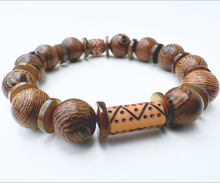 Load image into Gallery viewer, Wooden bead bracelet with thin shiny brown shells.