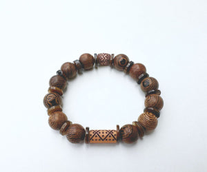 Wooden bead bracelet with thin shiny brown shells.